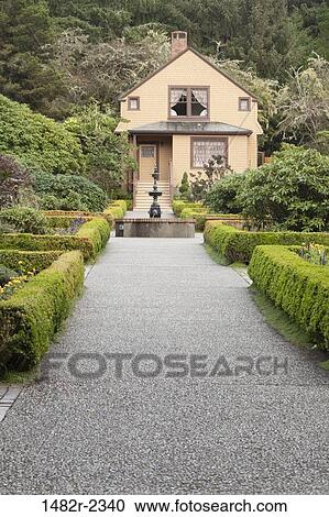 Stock Image - USA, Oregon, Shore Acres State Park, Garden and house. Fotosearch