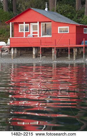 USA, Washington, Poulsbo, beach house View Large Photo Image Stock Photography - USA, Washington, Poulsbo, beach house. Fotosearch