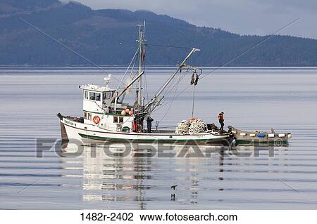 USA, Washington, Seabeck, Fishermen in boat on Hood Canal View Large Photo Image Stock Image - USA, Washington, Seabeck, Fishermen in boat on Hood Canal. Fotosearch