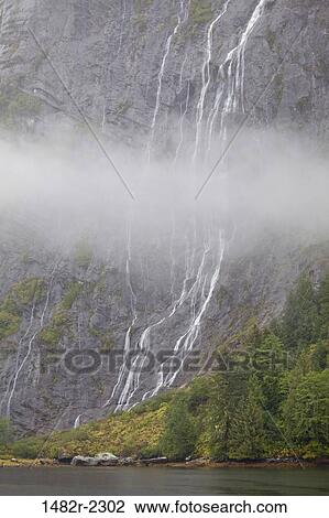 Waterfall from rocks, Fiordlands National Recreation Area, British Columbia, Canada View Large Photo Image Stock Image - Waterfall from rocks, Fiordlands National Recreation Area, British Columbia, Canada. Fotosearch