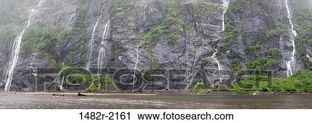 Waterfall, Rudyerd Bay, Misty Fiords National Monument, Alaska, USA View Large Photo Image Stock Image - Waterfall, Rudyerd Bay, Misty Fiords National Monument, Alaska, USA. Fotosearch