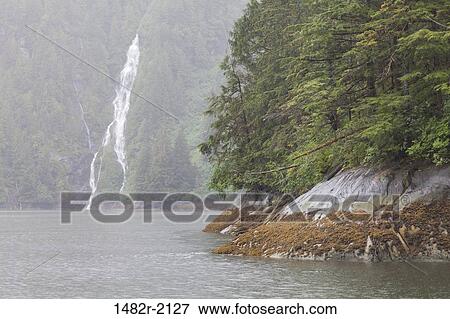Waterfall, Rudyerd Bay, Misty Fiords National Monument, Alaska, USA View Large Photo Image Stock Photo - Waterfall, Rudyerd Bay, Misty Fiords National Monument, Alaska, USA. Fotosearch
