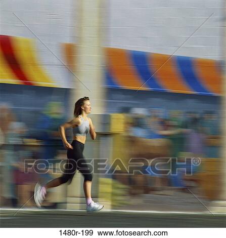 Stock Photo - Woman running on the sidewalk. Fotosearch