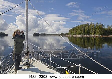 Woman standing on a SV Nawalak yacht from Orcas Island, Washington State, USA to British Columbia, Canada View Large Photo Image Stock Image - Woman standing on a SV Nawalak yacht from Orcas Island, Washington State, USA to British Columbia, Canada. Fotosearch