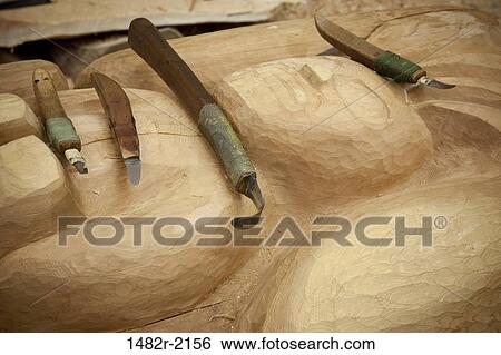 Work tools on a totem pole, Potlatch Totem Park, Ketchikan, Alaska, USA View Large Photo Image Stock Photograph - Work tools on a totem pole, Potlatch Totem Park, Ketchikan, Alaska, USA. Fotosearch