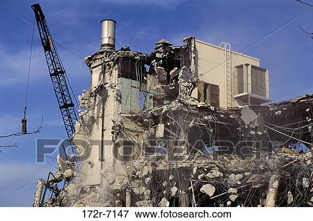 Wrecking ball and a demolished building View Large Photo Image Stock Photo - Wrecking ball and a demolished building. Fotosearch