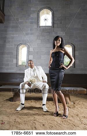 A couple in formal attire in a medieval castle View Large Photo Image Stock Image - A couple in formal attire in a medieval castle. Fotosearch