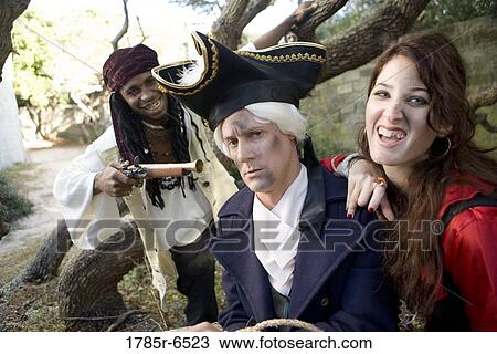 Armed pirates holding a navy officer as hostage and threatening him with weapons View Large Photo Image Stock Image - Armed pirates holding a navy officer as hostage and threatening him with weapons. Fotosearch