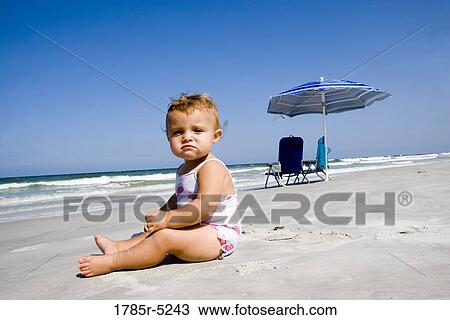 Baby on beach View Large Photo Image Stock Image - Baby on beach. Fotosearch