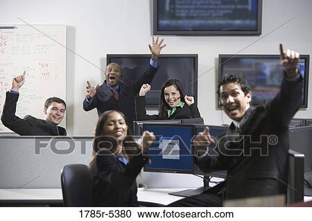 Business people cheering in an office View Large Photo Image Stock Image - Business people cheering in an office. Fotosearch