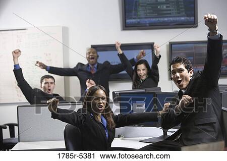Business people cheering in an office View Large Photo Image Stock Image - Business people cheering in an office. Fotosearch