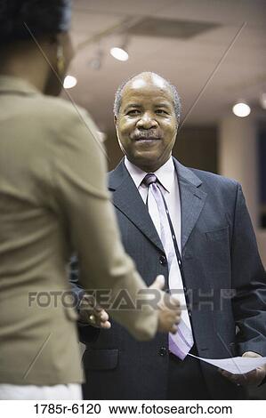 Business people meeting and shaking hands View Large Photo Image Stock Image - Business people meeting and shaking hands. Fotosearch