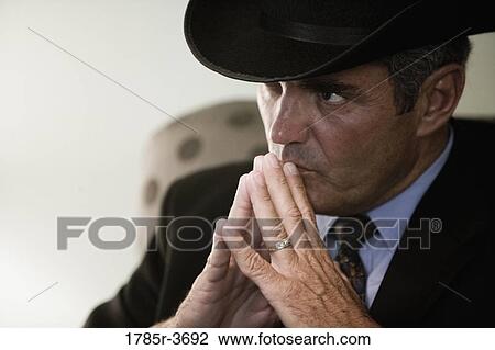 Businessman in contemplative mood View Large Photo Image Stock Image - Businessman in contemplative mood. Fotosearch