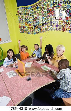 Children drawing and paying attention in art class View Large Photo Image Stock Image - Children drawing and paying attention in art class. Fotosearch