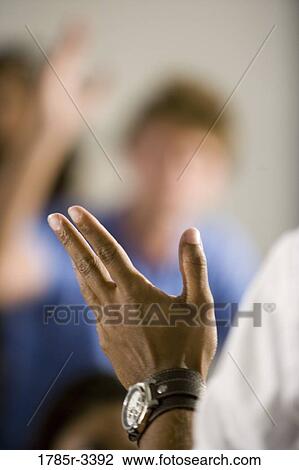 Close-up of a human hand gesturing toward others View Large Photo Image Stock Image - Close-up of a human hand gesturing toward others. Fotosearch