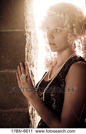 Close-up of a princess against a castle wall View Large Photo Image Stock Image - Close-up of a princess against a castle wall. Fotosearch