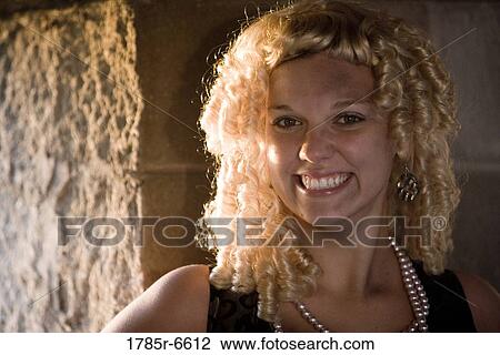 Close-up of a princess against a castle wall View Large Photo Image Stock Image - Close-up of a princess against a castle wall. Fotosearch