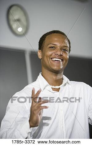 Close-up of a teacher in a classroom View Large Photo Image Stock Image - Close-up of a teacher in a classroom. Fotosearch
