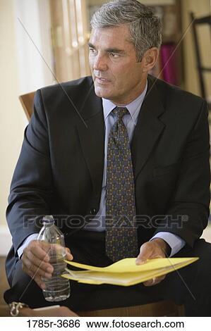 Close up of businessman in meeting View Large Photo Image Stock Photograph - Close up of businessman in meeting. Fotosearch