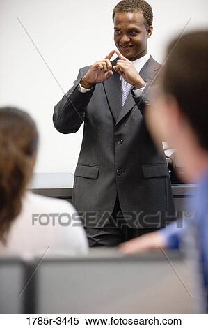 Close-up of businessman in meeting View Large Photo Image Stock Photography - Close-up of businessman in meeting. Fotosearch