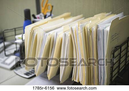 Stock Photograph - Close-up of file folders. Fotosearch