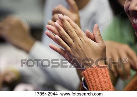 Picture - Close-up of hands clapping. Fotosearch