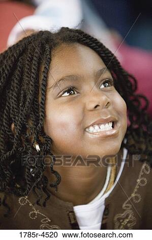 Stock Image - Close-up of little girl. Fotosearch