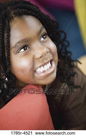 Close-up of little girl View Large Photo Image Stock Image - Close-up of little girl. Fotosearch