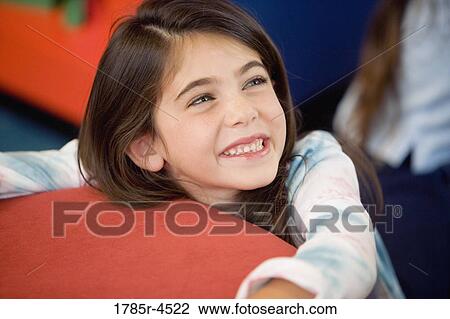 Stock Image - Close-up of little girl. Fotosearch