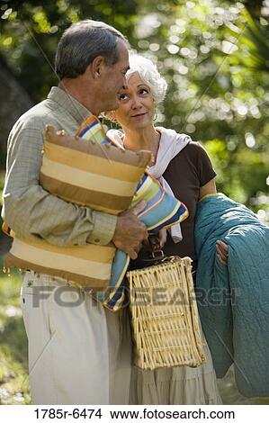 Close up of mature couple going on a picnic View Large Photo Image Picture - Close up of mature couple going on a picnic. Fotosearch