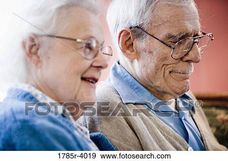Stock Photo - Close-up of senior couple smiling. Fotosearch