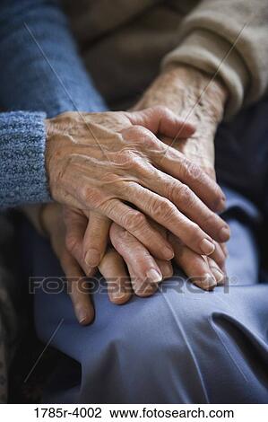 Close-up of senior couple's hands overlapping View Large Photo Image Stock Image - Close-up of senior couple's hands overlapping. Fotosearch