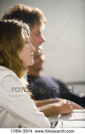 Picture - Close-up of students in a classroom. Fotosearch