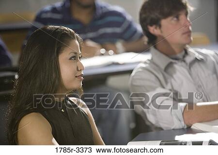 Close-up of students in a classroom View Large Photo Image Stock Image - Close-up of students in a classroom. Fotosearch