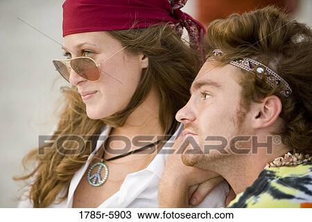 Close up of young hippie couple View Large Photo Image Stock Image - Close up of young hippie couple. Fotosearch