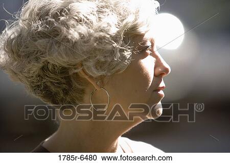 Close-up profile of mature woman View Large Photo Image Stock Image - Close-up profile of mature woman. Fotosearch