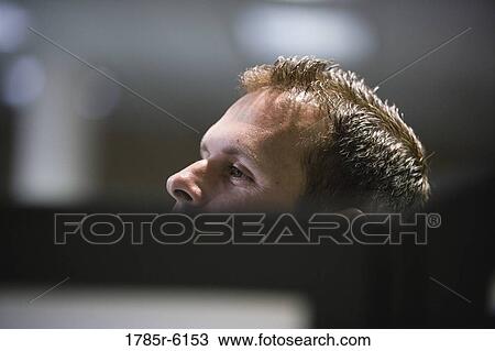 Close-up view of a man looking over a wall View Large Photo Image Stock Image - Close-up view of a man looking over a wall. Fotosearch