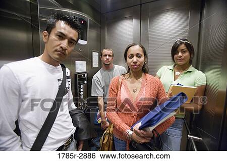 College students riding elevator View Large Photo Image Stock Photograph - College students riding elevator. Fotosearch