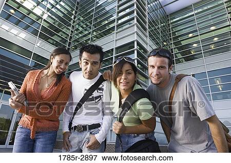 Stock Photo - College students standing in front of a building. Fotosearch