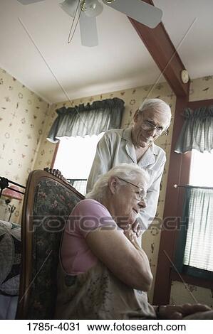 Elderly couple comforting each other View Large Photo Image Stock Image - Elderly couple comforting each other. Fotosearch