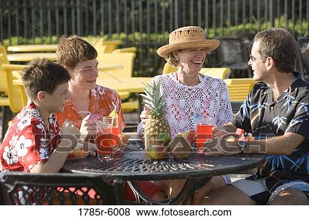 Family enjoying tropical vacation View Large Photo Image Stock Photo - Family enjoying tropical vacation. Fotosearch