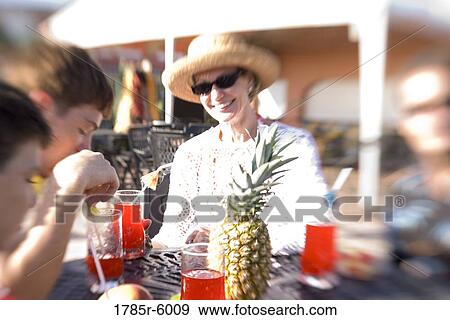 Family enjoying tropical vacation View Large Photo Image Stock Photo - Family enjoying tropical vacation. Fotosearch