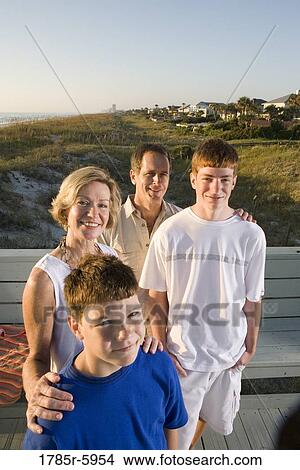 Family vacation at the beach View Large Photo Image Picture - Family vacation at the beach. Fotosearch