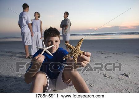 Family vacation at the beach View Large Photo Image Stock Image - Family vacation at the beach. Fotosearch