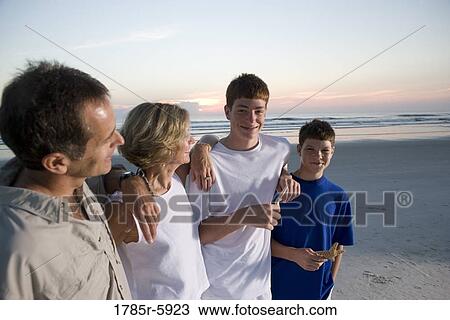 Family vacation at the beach View Large Photo Image Stock Image - Family vacation at the beach. Fotosearch