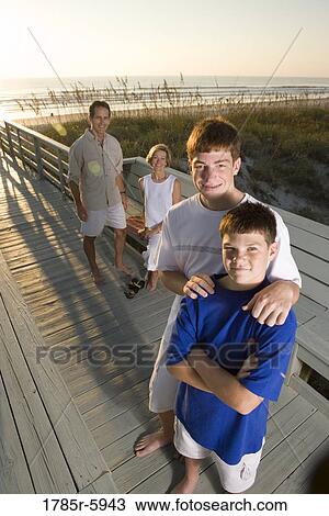 Family vacation at the beach View Large Photo Image Stock Image - Family vacation at the beach. Fotosearch