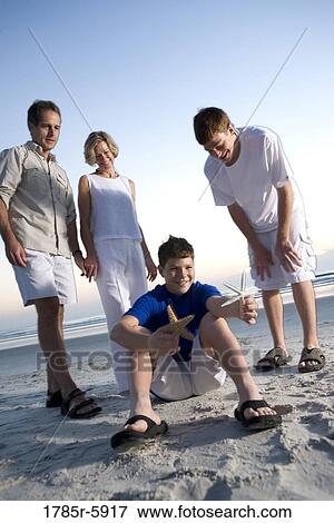 Family vacation at the beach View Large Photo Image Stock Photo - Family vacation at the beach. Fotosearch
