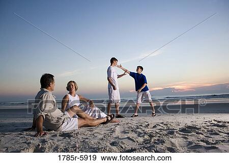 Family vacation at the beach View Large Photo Image Stock Photo - Family vacation at the beach. Fotosearch