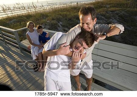Family vacation at the beach View Large Photo Image Stock Photo - Family vacation at the beach. Fotosearch