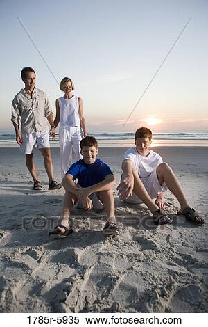 Stock Photography - Family vacation at the beach. Fotosearch